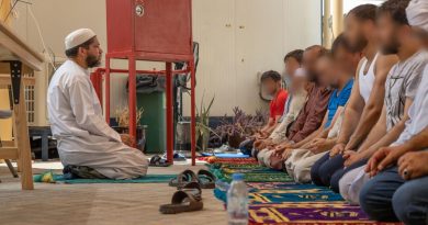 Islamic Imam, Royal Australian Navy Chaplain Majidih Essa, conducts Friday prayers for Muslim Afghanistan evacuees at the ADF's main operating base in the Middle East. Story by Lieutenant Max Logan. Photo by Leading Aircraftwoman Jacqueline Forrester.