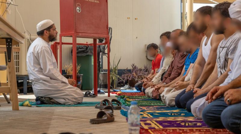 Islamic Imam, Royal Australian Navy Chaplain Majidih Essa, conducts Friday prayers for Muslim Afghanistan evacuees at the ADF's main operating base in the Middle East. Story by Lieutenant Max Logan. Photo by Leading Aircraftwoman Jacqueline Forrester.