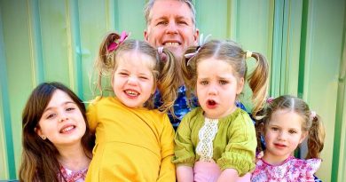 Flight Lieutenant Neil Young with his daughters, from left, Alexa, 6, twins Ella and Sophia, 2, and Ariana, 4. Story by Bettina Mears.