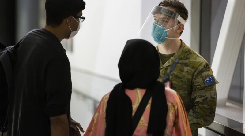 Private Jordan Schooth assists Australian citizens and visa holders evacuated from Afghanistan after their arrival in Australia. Story by Lieutenant Brendan Trembath. Photo by Corporal Dustin Anderson.