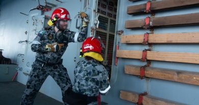 Able Seaman Paul Murra and Able Seaman Lydia Monk participate in a fire hose drill during damage control training on board HMAS Sirius. Story by Lieutenant Commander Ric Mingramm.