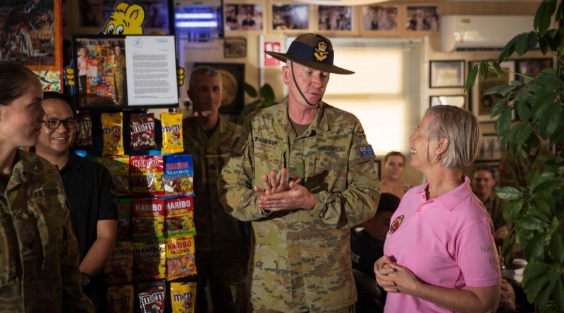 Commander Joint Task Force 633 Air Commodore David Paddison celebrates the 10th anniversary of the ‘Bean around the MEAO’ café with owner Aileen Stoddart. Story by Flight Lieutenant Clarice Hurren. Photo by Sergeant Glen McCarthy.