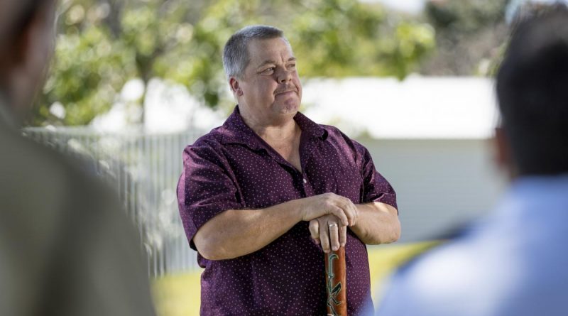 Indigenous elder David Boye speaks to guests during his enlistment ceremony in Townsville. Story by Captain Lily Charles. Photo by Corporal Brodie Cross.