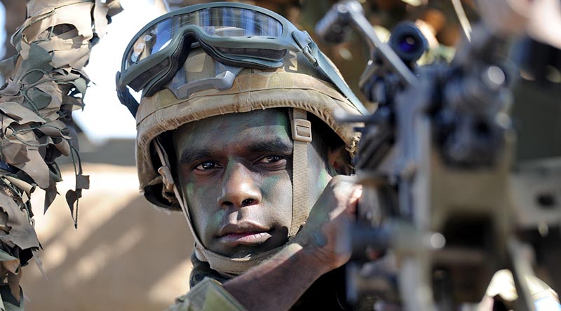 Australian Army soldier Private Clayton Baird from 51st Battalion, Far North Queensland Regiment, ready for a vehicle-mounted patrol during a training exercise in the Townsville Field Training Area. Photo by Major Al Green.