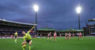 ADF Aussie Rules Association’s Sergeant David Wood umpires an AFL match at the SCG during the 2021 Toyota AFL Sir Doug Nicholls Round. Story by Lieutenant Ben Willee.