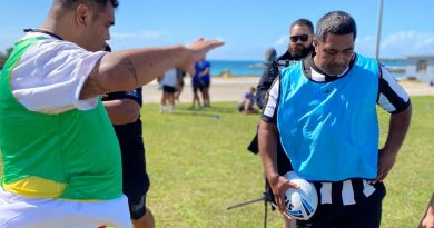 Tongan participants Vaopako Pongi, left, and Lolomanoia Tuifua enjoy a practical session for rugby league coaches, including game-day drills. Story by Alex DeValentin.