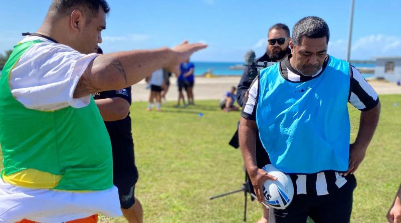 Tongan participants Vaopako Pongi, left, and Lolomanoia Tuifua enjoy a practical session for rugby league coaches, including game-day drills. Story by Alex DeValentin.