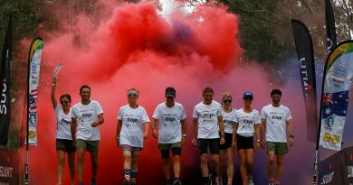 Australian and American ultramarathon runners celebrate the completion of the 1000 Miles to Light run held around Singleton Military Area, NSW. Story by Lieutenant Sasha Rhodes.