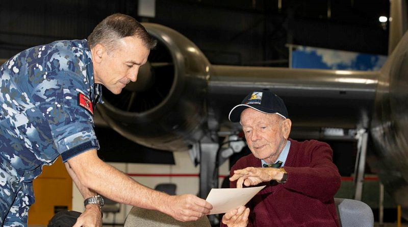 Bryan "Mick" McShane, right, shares some of his memories of the Air Force with Warrant Officer Russell Beck at the RAAF Base Amberley Aviation Heritage Centre. Story by Flying Officer Robert Hodgson. Photo by Corporal Jesse Kane.