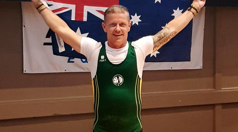 Champion weightlifter Sergeant Steven Graham celebrates his best result. Story by Corporal Veronica O’Hara.