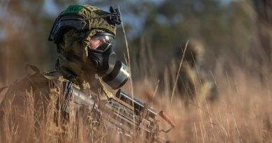 A soldier from the 6th Battalion, Royal Australian Regiment, patrolling during a simulated chemical, biological, radiological, nuclear survival training exercise at Townsville Field Training Area, Queensland. Story by Captain Taylor Lynch. Photo by Corporal Nicole Dorrett.
