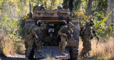 Sappers from the 2nd Combat Engineer Regiment dismount an Australian Army M113AS4 Armoured Personnel Carrier to conduct a simulated breach of an enemy position while training at Townsville Field Training Area, Queensland. Photo by Corporal Nicole Dorrett.