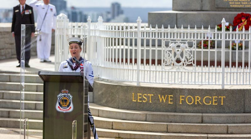 Leading Seaman Kirsten Robinson sings the German National Anthem during a commemorative service held at the Western Australian State War Memorial in King’s Park, as part of FGS Bayern's visit to Western Australia during their ongoing Indo-Pacific deployment. Story by Lieutenant Rilana Ostheim. Photo by Leading Seaman Ronnie Baltoft.