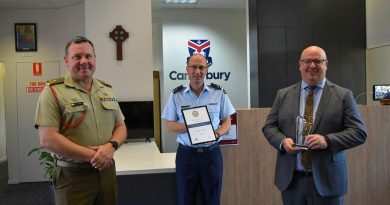 Major Ben Lanskey from Defence Reserves Support, left, Canterbury College's Flight Lieutenant Greg Wacker and Canterbury College principal Daniel Walker at the presentation of the Queensland Employer Support Award 2021. Story by Flight Lieutenant Nick O’Connor.
