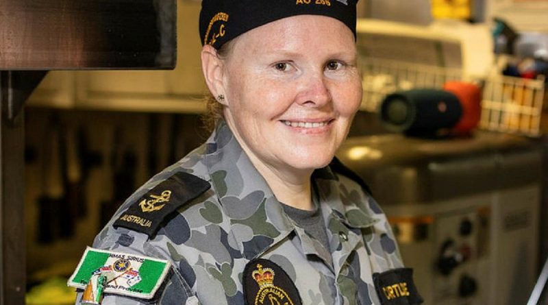 Leading Seaman Esler Cartledge in the galley on board HMAS Sirius during Indo-Pacific Endeavour 21. Story by Captain Peter March. Photo by Leading Seaman Sittichai Sakonpoonpol.