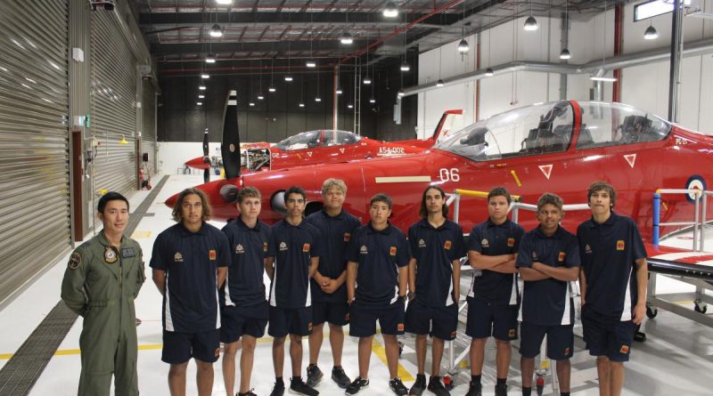 Qualified flying instructor with No. 2 Flying Training School Flight Lieutenant Jonathan Lee and students from Clontarf Academy in front of a Pilatus PC-21 aircraft at RAAF Base Pearce. Story by Flight Lieutenant Steven Barrett.