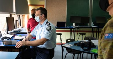 Detective Sergeant Mark Dalton, front, provides feedback to Joint Civil-Military Cooperation Staff Planning Course participants, supported by Senior Instructor Major Brian Willsher, right, and Major Frank Aisake, left, of Headquarters 1st Division. Story by Captain Lily Charles.