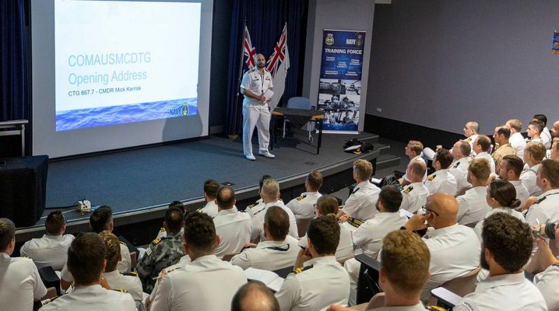 Commander Australian Mine Warfare and Clearance Diving Task Group, Commander Micheal Kerrisk, delivers the opening address to Australian and American personnel participating in Exercise Dugong 2021. Story by Photo by Lieutenant Jessica Craig. Leading Seaman Ronnie Baltoft.