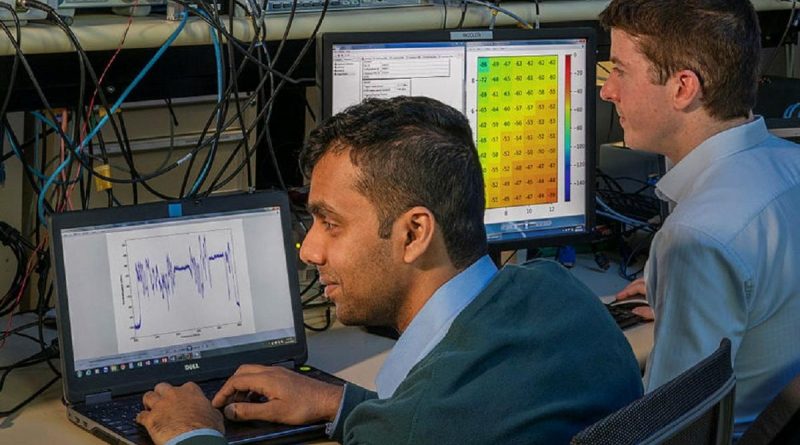 Defence Science and Techonology Group's Bathiya Senanayake, left, and an RFTEQ team member testing the new Complex Adaptive Threat Jammer Technology system at DSTG Edinburgh, South Australia.
