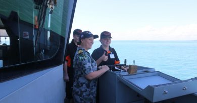 Commanding Officer HMAS Maitland Lieutenant Commander Julia Griffin shows Kyle Firgula-White and Alex Ryan how to drive the ship. Story by Lieutenant Liam Feenan.
