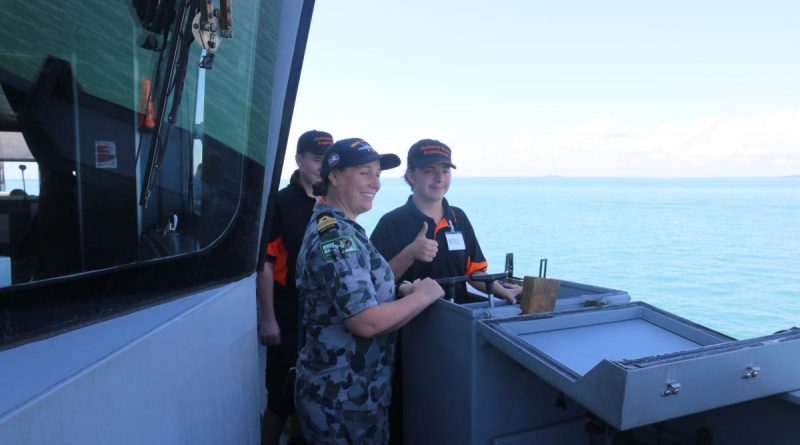 Commanding Officer HMAS Maitland Lieutenant Commander Julia Griffin shows Kyle Firgula-White and Alex Ryan how to drive the ship. Story by Lieutenant Liam Feenan.