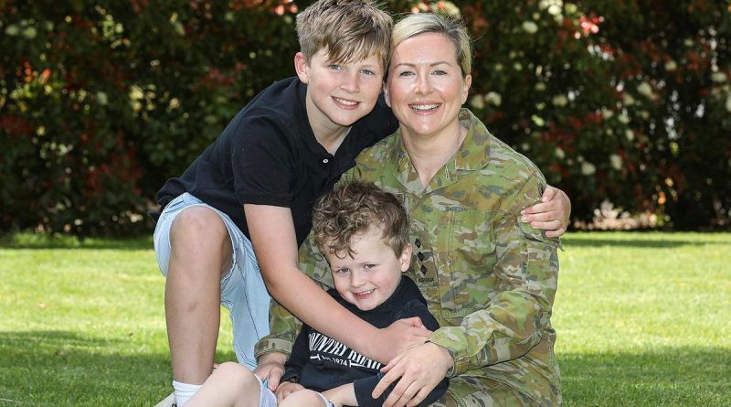 Captain Laura McCarthy is serving part-time under Service Category 3, and is pictured with her children at home. Story by Jessica Cameron. Photo by Corporal Brenton Kwaterski.