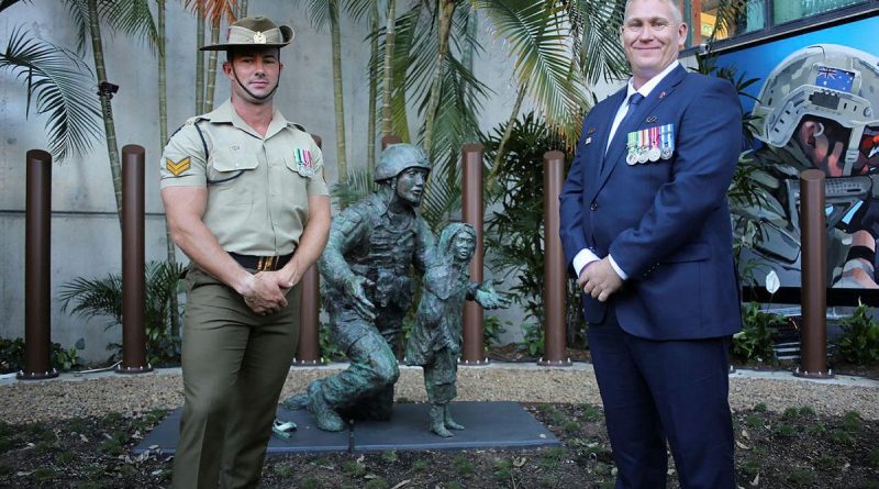 Corporal Ty Fergus, of the 6th Engineer Support Regiment, who helped build the Afghanistan War Memorial Garden in Brisbane, with 42 for 42 Board President and former combat engineer, Sean Mulqueen, at the memorial's opening. Story by Captain Evita Ryan.