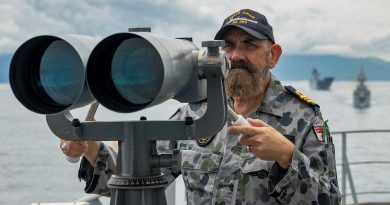 Lieutenant Commander Richard Mingramm looks out from the starboard bridge wing of HMAS Sirius, as the ship departs Cam Rah Bay, Vietnam, during Indo-Pacific Endeavour 2021. Story by Captain Peter March. Photo by Leading Seaman Sittichai Sakonpoonpol.