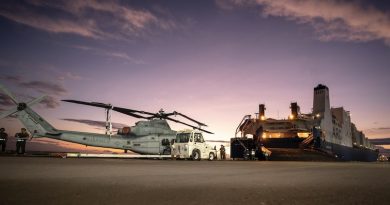 US Marines with Marine Medium Tiltrotor Squadron 363 (Reinforced), Marine Rotational Force – Darwin, prepare to load a UH-1Y Venom onto a ship at the East Arm Wharf, Darwin, in September. US Marine Corps photo by Corporal Lydia Gordon.