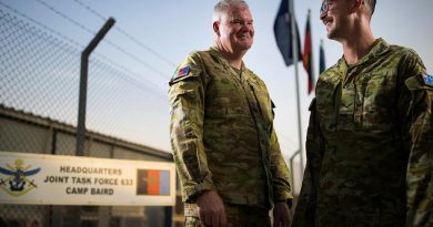 Major Brett Pates, left, and his son, Lance Corporal Timothy Pates, are both deployed to the Middle East region on Operation Accordion. Story by Flight Lieutenant Clarice Hurren. Photo by Sergeant Glen McCarthy.