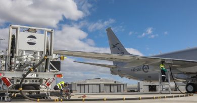 Leading Aircraftman Peyman Zeinali, left, and Leading Aircraftman Nicolas Ballingal use RAAF Base Edinburgh's in-ground refuelling system for the first time with an Air Force P-8A Poseidon. Story by Corporal Abbey Leonard. Photo by Corporal Brenton Kwaterski.