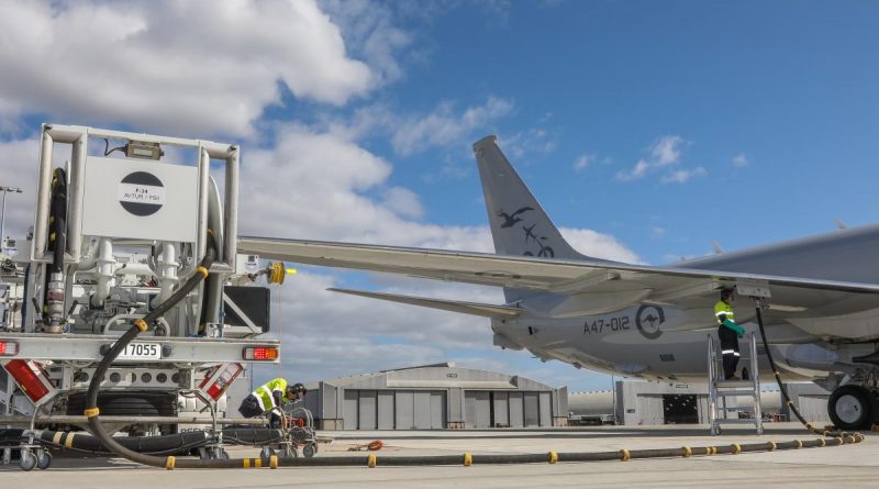 Leading Aircraftman Peyman Zeinali, left, and Leading Aircraftman Nicolas Ballingal use RAAF Base Edinburgh's in-ground refuelling system for the first time with an Air Force P-8A Poseidon. Story by Corporal Abbey Leonard. Photo by Corporal Brenton Kwaterski.