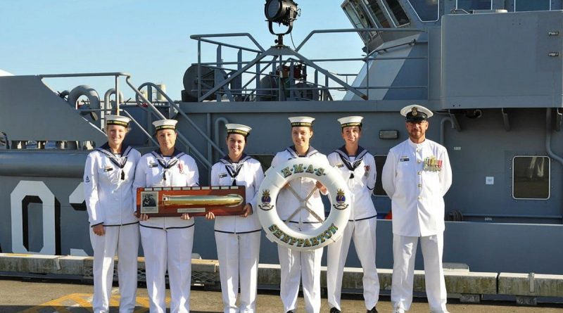 HMAS Shepparton's Hydrographic Department proudly displays the First Lady of the Fleet plaque at HMAS Cairns. Story by Able Seaman Emily Wain and Able Seaman Rebecca Churches.