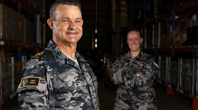 Petty Officer Ross Currie, left, and Seaman Caitlin Palmer wear the Navy's new maritime multi-cam pattern uniform at Fleet Logistic Support Element - Darwin, HMAS Coonawarra. Photo by Leading Seaman Shane Cameron.