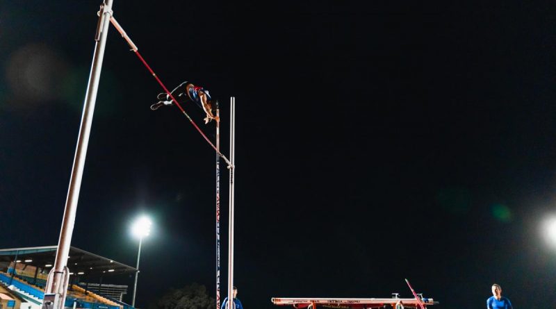 Corporal Brodie Cross clears the bar in the open men's pole vault at the Athletics NQ Championships in Townsville. Story by Corporal Veronica O'Hara.