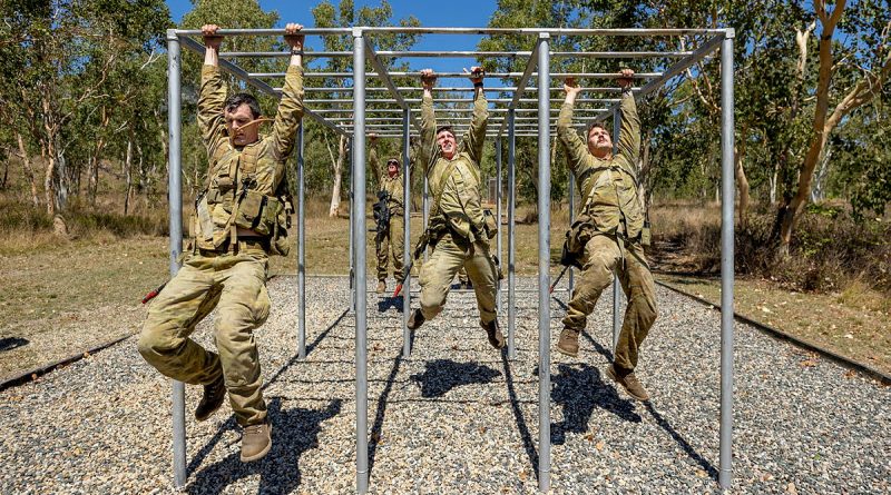 Australian Army soldiers from the 4th Regiment, Royal Australian Artillery, tackle the obstacle course during Exercise Turbulent Dawn, at Lavarack Barracks, Queensland. Story by Captain Diana Jennings. Photo by Corporal Brandon Grey.