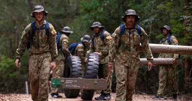 The Queensland Reds rugby team, hosted by the 6th Battalion, Royal Australian Regiment conduct a stores carry during a three-day training camp at Kokoda Barracks, Canungra, Queensland. Story by Captain Jesse Robilliard. Photo by Corporal Nicole Dorrett.