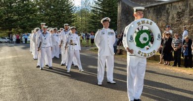 The ship's company of HMAS Sirius stands ready to step off for a march through the streets of Norfolk Island as part of a final visit to the ship's ceremonial home port. Story by Lieutenant Jessica Craig. Photo by Leading Seaman Sittichai Sakonpoonpol.