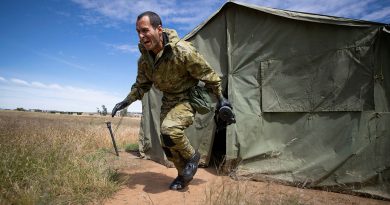 Recruit Nomar Romero-Perez from Charlie Company, Army Recruit Training Centre, exits the mask testing area during CBRN training at Kapooka, New South Wales. Photo by Trooper Jonathan Geodhart.