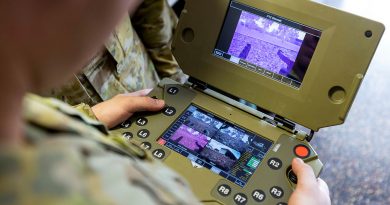 An Army Sapper runs tests on a robot control terminal focusing on autonomous systems , artificial intelligence and machine learning. Story by Edwina Callus. Photo by Corporal Brodie Cross.