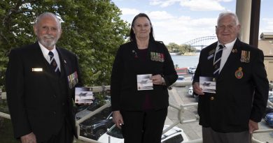 Naval Association of Australia National President David Manolas, Vice President Lorraine Grey and NSW Section President Keith Grimley hold 'Once Navy, Always Navy' commemorative compact discs featuring the new recording.