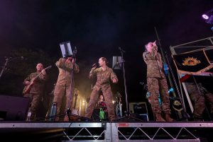 The Rock Band of the First Battalion, The Royal Australian Regiment, perform during the Queensland Emergency Services and ADF Sunset Showcase at Riverway Stadium, Townsville, Queensland. Photo by Corporal Brandon Grey.