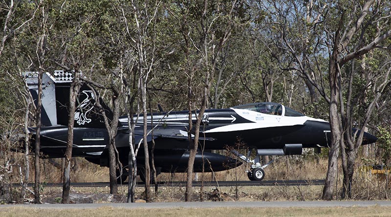 In celebration of their mascot, the Australian magpie, No. 75 Squadron applied a black and white commemorative paint scheme to F/A-18A Hornet A21-018. The aircraft will sport the new colour scheme ahead of the squadron's transition to the F-35A Lightning II in 2022. The squadron adopted the magpie because it is a belligerent defendant of its young with the courage to attack. Photo by Sergeant Pete Gammie.