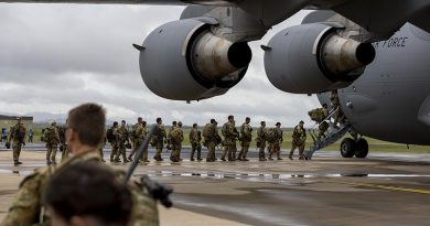 Australian Army soldiers from Joint Task Group 637.3 board a Royal Australian Air Force C-17A Globemaster III at RAAF Base Townsville, Queensland, deploying to the Solomon Islands on 26 November 2021. Photo by Corporal Brandon Grey.