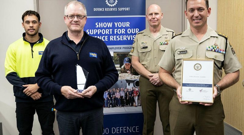 Corporal Rhys Hadfield, left, O’Brien Electrical and Data Joondalup's Jason Bridges, Warrant Officer Class One Peter Duff, and Commanding Officer 16th Battalion, Royal Western Australia Regiment, Lieutenant Colonel Leigh Partridge. Story by Flight Lieutenant Nick O’Connor.