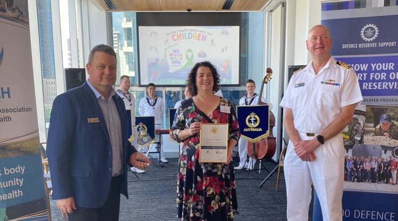 Petty Officer Nigel Barrett, left, with Western Australian Association for Mental Health CEO Taryn Harvey and Commanding Officer HMAS Stirling Captain Gary Lawton at the presentation of an Employer Support Award to the association in Perth. Story byFlight Lieutenant Nick O’Connor