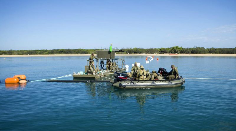 Australian Army petroleum operators set up a pontoon and towed flexible barge system at the Cowley Beach Training Area during Exercise Overland Nautical Petros 21. Story by Private Jacob Joseph.