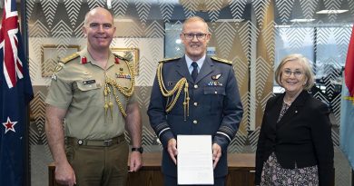 Chief of the New Zealand Defence Force Air Marshall Kevin Short is presented the Operation Bush Fire Assist Commendation on behalf of the New Zealand Defence Force, by Colonel Neil Peake the Australian Defence Attache accompanied by Australian High Commissioner to New Zealand Patricia Forsythe. NZDF photo.