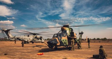 Australian Army Ground Crew Aircraft Support personnel, of the 1st Aviation Regiment, re-arm ARH Tigers at a US Marine Corps CH-53E Super Stallion air deployed ground refuel point, during Exercise Griffin Eagle. Story by Captain Carolyn Barnett. Photo by Captain Gavin Partridge.