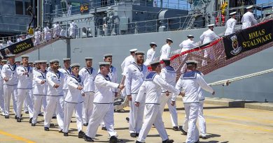 HMAS Stalwart's Ship's Company "crew ship" for the first time during a commissioning ceremony for the auxiliary oiler replenishment at Fleet Base West, Rockingham, WA. Photo by Leading Seaman Ernesto Sanchez.